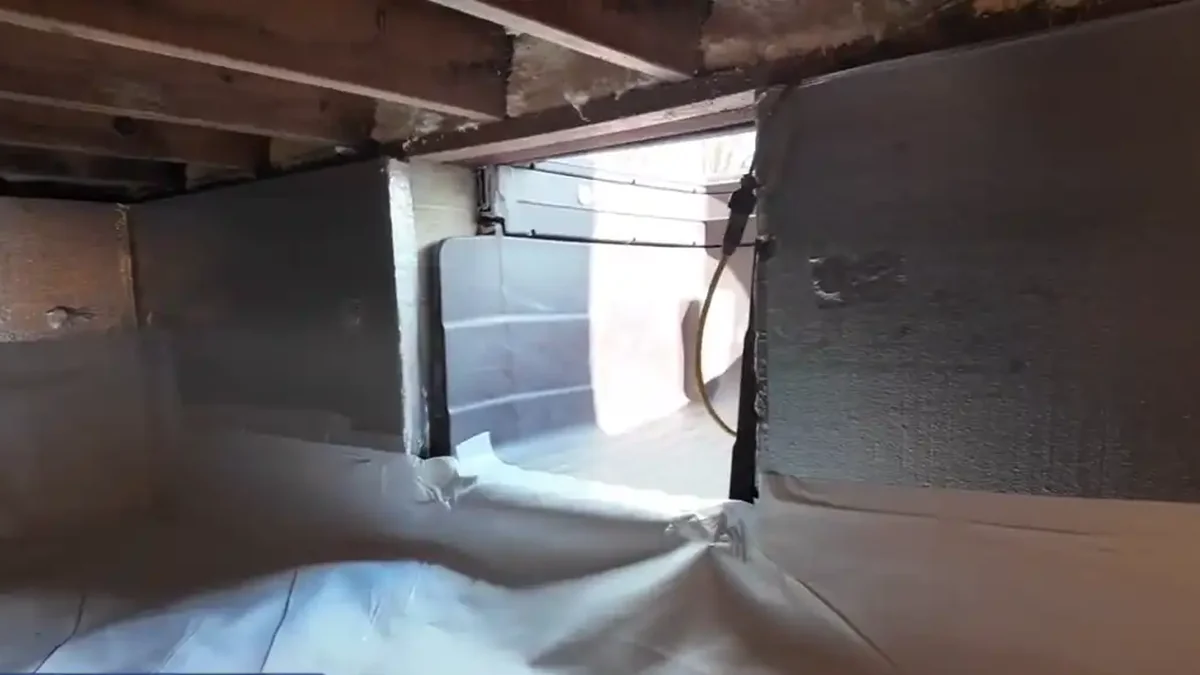 Insulated crawl space walls and sealed vapor barrier, an example of crawl space encapsulation in Virginia